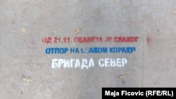 Serbian graffiti in North Mitrovica from a group called Brigade North urging "resistance" to Pristina's efforts to re-register vehicles with old license plates issued by Belgrade. 