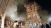 Rescuers and firefighters work at the site of a massive explosion that destroyed a nine-story apartment building on Guryanov Street in southeastern Moscow on September 9, 1999.