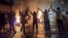 Young Iranians protest against the government in the western city of Sanandaj on November 16. 