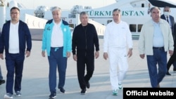 The five Central Asian leaders -- Kyrgyzstan's Sadyr Japarov (left to right), Kazakhstan's Qasym-Zhomart Toqaev, Uzbekistan's Shavkat Mirziyoev, Turkmenistan's Gurbanguly Berdymukhammedov, and Tajikistan's Emomali Rahmon -- gather in Awaza, Turkmenistan, for a summit in August 2021.