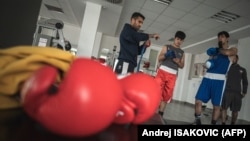 Afghan boxers train at a gym on the outskirts of Belgrade on November 26.