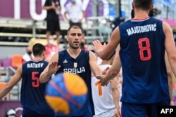 A player for Serbia's national basketball team wears a Chinese brand Peak jersey during the Tokyo Olympics.