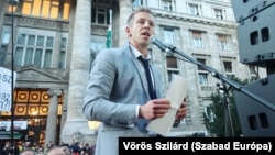 Peter Magyar -- among the ruling party’s most senior defectors -- speaks at a protest in downtown Budapest on March 26.