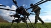 A Ukrainian soldier checks a connection with a Vampire attack drone before flying near the front line. The report says cooperation with China on network technology could provide Russia with the military breakthrough it desires.