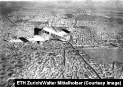 A Junkers airplane photographed by Mittelholzer flying over Tehran