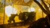 A Ukrainian soldier of the 10th Assault Brigade Edelweiss fires a D-30 cannon toward Russian positions at the front line near Bakhmut, Donetsk region, Ukraine, on July 5.