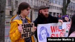 Demonstrators rally in support of Seda Suleimanova in Berlin on February 27.