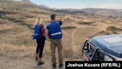 Monitors from the EU Mission in Armenia, Ema Stastna (left) and Thomas Tartarin, on patrol in between the villages of Gomk and Zaritap.