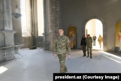 Azerbaijani President President Ilham Aliyev inside Shusha’s Ghazanchetsots Cathedral in January 2021.