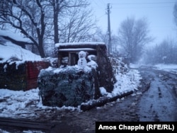 A snowman at a Ukrainian military position in Zolote