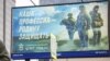 A billboard in Moscow recruits men to join the Russian Army in its war in Ukraine. 