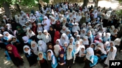 Afghan schoolgirls attend an open-air primary school in Khogyani, a district in eastern Nangarhar Province. (file photo)