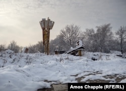 A broken sign at a military position on the outskirts of Popasna in December 2021