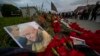 A portrait of Wagner Group owner Yevgeny Prigozhin is seen at an informal memorial in St. Petersburg on August 24 after his death.