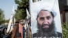 A poster of the Taliban's spiritual leader, Hibatullah Akhundzada, is seen along a road in Kabul in 2023.