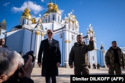 U.S. President Joe Biden (left) made an unannounced visit to Kyiv and met with Ukrainian President Volodymyr Zelenskiy (second from right) on February 20.