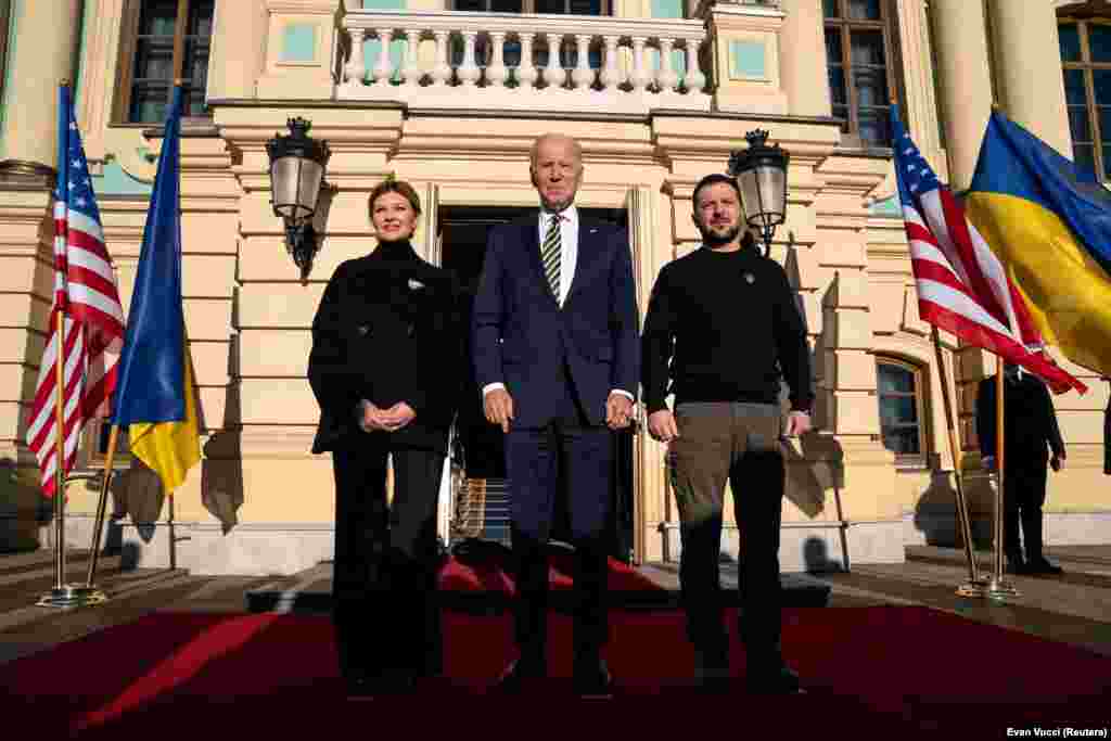 Biden (center) poses with Zelenskiy (right) and Olena Zelenska at Mariynskiy Palace during his nannounced visit to Kyiv on February 20. The visit took place several days ahead of the first anniversary of Russia&#39;s brutal invasion of the country.