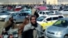 A screen grab from a video made in February shows Afghan men leaving a football stadium after attending the public execution by Taliban authorities of two men convicted of murder. 