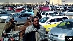 A screen grab from a video made in February shows Afghan men leaving a football stadium after attending the public execution by Taliban authorities of two men convicted of murder. 