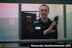 Aleksei Navalny appears on a video link from prison during a hearing at the Russian Supreme Court in Moscow on August 23.