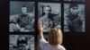 A woman attends a ceremony on Kyiv's Independence Square commemorating soldiers killed in a July 2022 strike that destroyed a building housing Ukrainian prisoners of war in Olenivka, eastern Ukraine. 