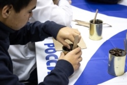 In Khakassia, children with hearing loss make trench candles.