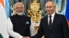 Russian President Vladimir Putin (right) meets with Indian Prime Minister Narendra Modi at the Kremlin in Moscow in July.