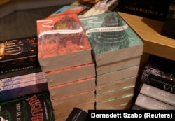 Books that feature LGBT characters are seen wrapped in plastic at a bookstore in Budapest on July 11, 2023.