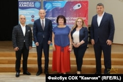 Yanka Takeva (center), president of the Union of Bulgarian Teachers, poses with the the education minister during the GERB government Krasimir Valchev (second left) and other officials.