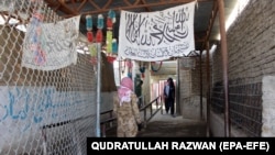 A Taliban fighter stands guard at the Spin Boldak border crossing connecting southern Afghanistan and southwestern Pakistan.