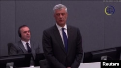 Former Kosovar President Hashim Thaci pleads not guilty to war crimes charges on the first day of his trial in The Hague on April 3.