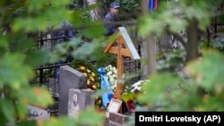 Flowers are seen on the grave of Wagner Group chief Yevgeny Prigozhin after a funeral at the Porokhovskoye cemetery in St. Petersburg on August 29.