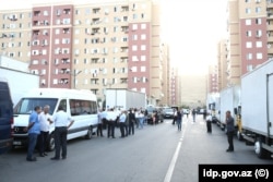 Azerbaijani residents moving into new apartments in Fuzuli in August 2023.