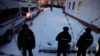 Police officers stand outside a police station where detained Russian opposition leader Aleksei Navalny was being held, outside Moscow, in January 2021. 