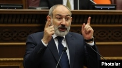 Armenian Prime Minister Nikol Pashinian speaks in the parliament in Yerevan on June 12.