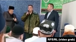 Video obtained by RFE/RL purportedly shows a Russian military recruiter speaking to labor migrants from Central Asian at a mosque in the Urals city of Chelyabinsk in April 2023.