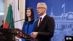 Under a new coalition deal in Bulgaria, Maryia Gabriel (left) from the center-right GERB party and Nikolay Denkov from the centrist, anti-corruption We Continue The Change party will rotate as the head of the government every nine months.