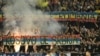 Romanian fans hold up a banner reading "Kosovo is Serbia" at the Euro 2024 qualifier match against Kosovo in Bucharest on September 12.