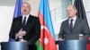 Azerbaijani President Ilham Aliyev and German Chancellor Olaf Scholz hold a joint press conference in Berlin on April 26.