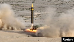 A fourth-generation ballistic missile called Kheibar with a range of 2,000 kilometers is test-launched at an undisclosed location in Iran in May 2023. (file photo)