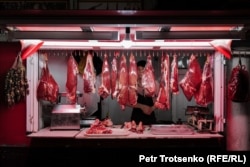 A meat seller in the Panjshanbe market in Khujdand city, Tajikistan, on June 14