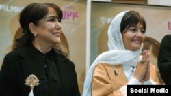 Actress Pantea Bahram (left) participated in the public screening of a film without wearing the obligatory hijab.