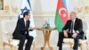 Israeli President Isaac Herzog (left) and Azerbaijani President Ilham Aliyev hold talks in Baku on May 30, ringing alarm bells in Tehran.