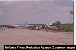 Destroyed bombers at the unidentified airfield in Ukraine.