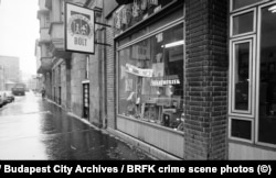 A broken shopfront window after an apparent smash and grab