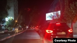  Long lines of cars wait for fuel at a gas station in Tehran on August 15. 