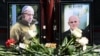 Portraits of Yevgeny Prigozhin (left)) and Dmitry Utkin, a shadowy figure who managed Wagner's operations and allegedly served in Russian military intelligence, are seen at a makeshift memorial in front of the Wagner office in Novosibirsk on August 24.