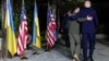 U.S President Joe Biden (right) walks with Ukrainian President Volodymyr Zelenskiy after a bilateral meeting on the sidelines of the G7 summit in Fasano, Italy, on June 13.