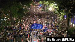 Protesters swarm the streets of Tbilisi to demonstrate against the so-called foreign agent law on April 28.