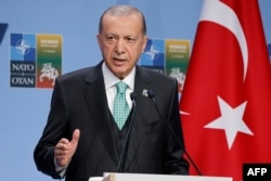 Turkish President Recep Tayyip Erdogan gives a press conference during the NATO Summit in Vilnius on July 12.